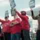 UAW EXPANDS STAND UP STRIKE AGAINST GENERAL MOTORS AND STELLANTIS