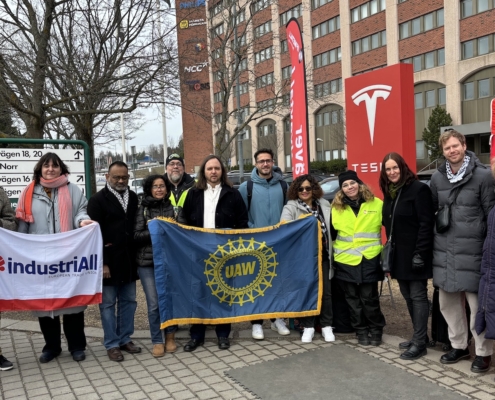 Photo of UAW International Affairs Director Kristyne Peter on the picket line IF Metall members at Tesla in Sweden.