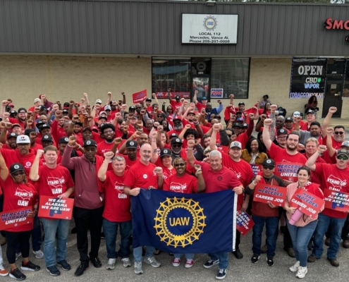 Photo of Mercedes-Benz workers in Vance, Alabama with UAW President Shawn Fain and Region 8 Director Tim Smith.