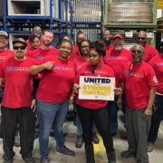 Local 5287 members who work at Thomas Built Buses in High Point, NC, wearing red shirts.