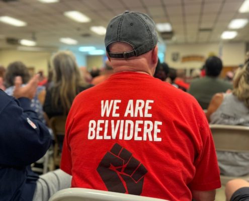 Photo of a UAW member wearing a red "We Are Belvidere" t-shirt at a Keep the Promise Rally at Local 1268.