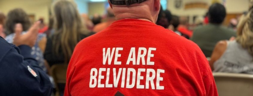 Photo of a UAW member wearing a red "We Are Belvidere" t-shirt at a Keep the Promise Rally at Local 1268.