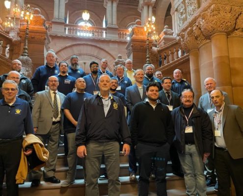Photo of UAW Local 259 members and Region 9A Director Brandon Mancilla at the New York State Capitol.