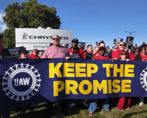 Photo of UAW members and leaders at rally demanding that Stellantis Keeps the Promise.