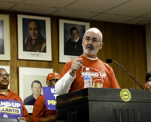 UAW President Shawn Fain addresses attendees at a Keep the Promise Stellantis rally at Local 372 in Trenton, MI.
