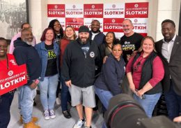 Photo of Elissa Slotkin with UAW President Shawn Fain and UAW members during a canvass for Slotkin's senatorial campaign.