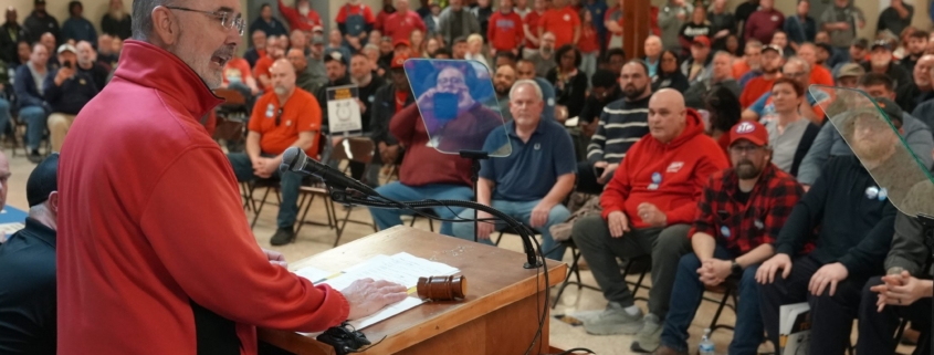 Photo of UAW President Shawn Fain addressing Local 933 members during a rally ahead of the union's contract expiring at Rolls-Royce in Indianapolis, IN.
