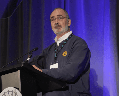 UAW President Shawn Fain addresses delegates at the union's 2025 Financial Officers Conference in Atlanta, GA.