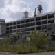 Photo of a destroyed shut down auto assembly plant.