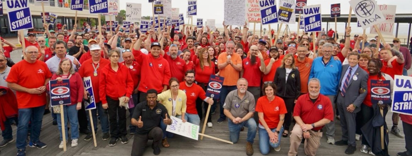 Photo of UAW Local 571 members and supporters during a rally leading up to the expiration of workers' General Dynamics-Electric Boat contract in Groton, CT.