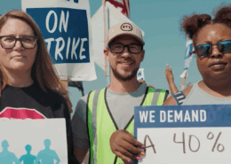 Photo of UAW members on the picket line during the union's 2023 Stand Up Strike at the Big Three automakers.