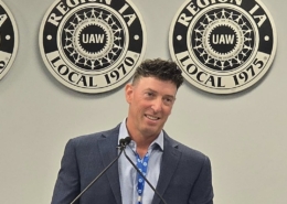 Photo of UAW Local 600 1st Vice President Mark DePaoli addressing Region 1A delegates after being elected the region's new director.