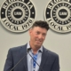 Photo of UAW Local 600 1st Vice President Mark DePaoli addressing Region 1A delegates after being elected the region's new director.