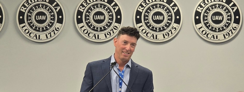 Photo of UAW Local 600 1st Vice President Mark DePaoli addressing Region 1A delegates after being elected the region's new director.