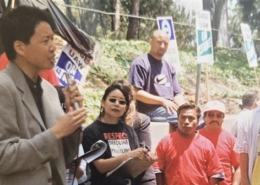 Photo of labor and human rights activist Kent Wong speaking at a 1995 UAW recognition strike at UCLA.