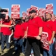 Photo of UAW Local 42 members speaking with the media during a practice picket at Volkswagen in Chattanooga, TN, on October 22, 2025.