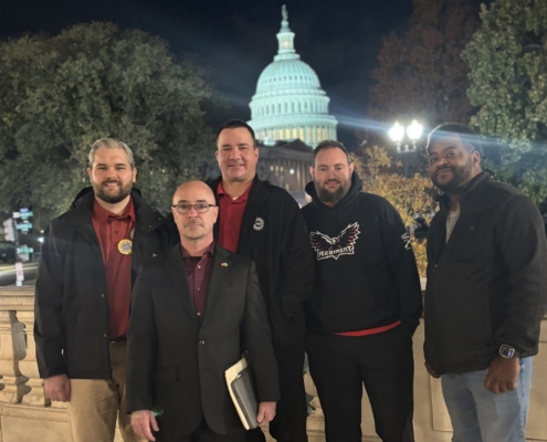 Photo of UAW Region 4 Director Brandon Campbell and union members in Washington D.C. in November 2025.