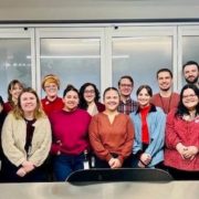 Region 4 Local 2320 Private Sector members stand inside office building for photo