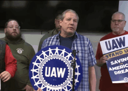Photo of UAW Local 2359 members speaking with the media on Conn-Selmer's decision to close its plant in Eastlake, OH.