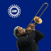 UAW graphic featuring a musician playing a trombone that was made at the Conn-Selmer plant in Eastlake, OH.
