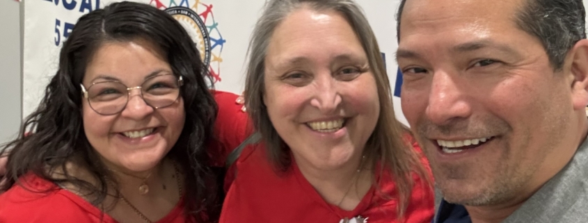 Photo of Ford Chicago Assembly plant nurses Debbie Garcia and Mary Quasney with UAW Local 551 President Chris Pena.