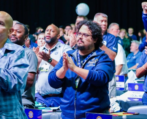 Photo of UAW delegates applauding during the union's 39th Constitutional Convention in Detroit on June 16, 2026.